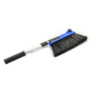 A long handle brush with black bristles on it.