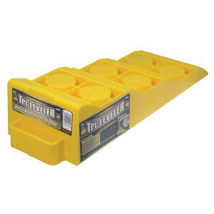 A yellow plastic block with a black label.