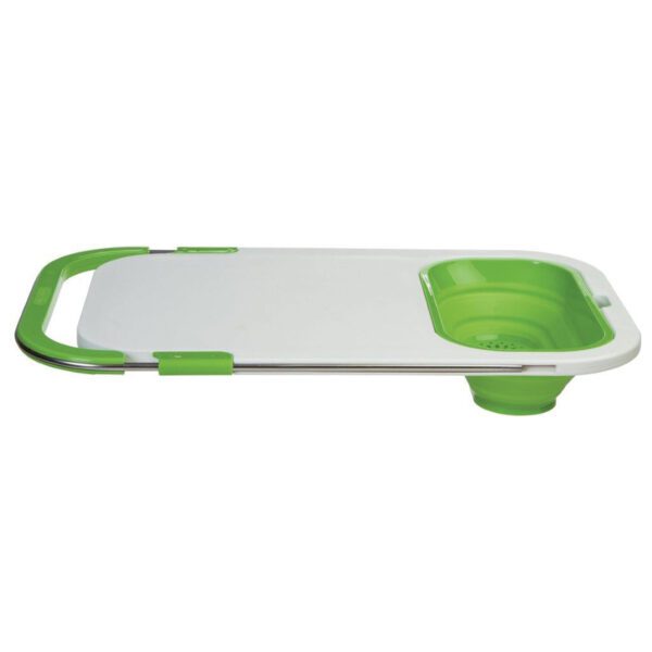 A green and white cutting board with a plastic container in it.