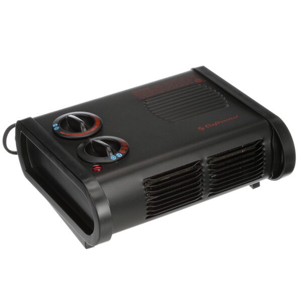 A black heater sitting on top of a white wall.