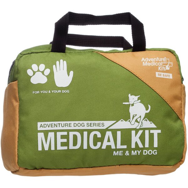 A green and brown bag with the words " adventure dog series medical kit me & my boo ".