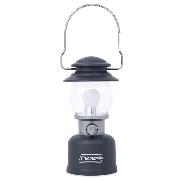 A black and silver lantern with a light on top of it.