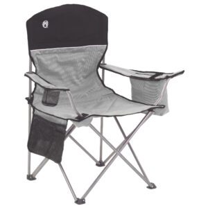 A black and gray folding chair with an arm rest.