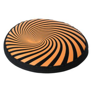 A round pillow with an orange and black spiral design.