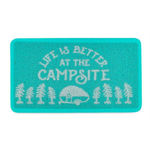 A blue and white patch with trees and a camper.