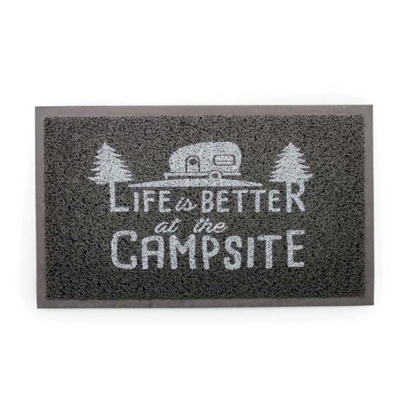 A black and white picture of a camper on the front door.